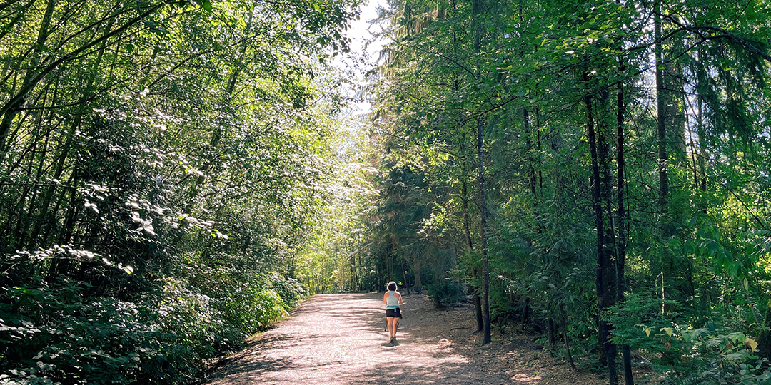 woman walking in forest