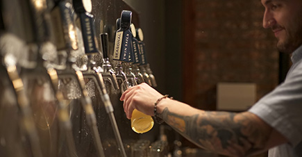 Man pouring beer
