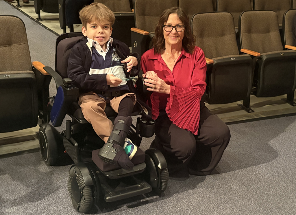 Spencer Moore with the 2025 Youth Sports Award