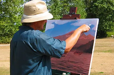 Artist painting in the park