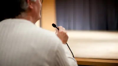 Man at microphone