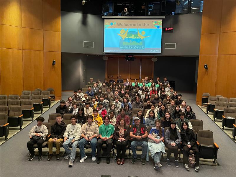 Youth participants sitting in the seats at the theatre