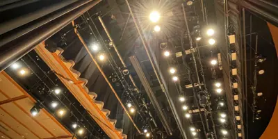 The lighting rig suspended from the ceiling