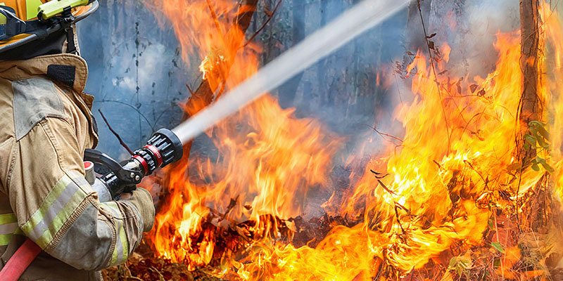Firefighter battling blaze