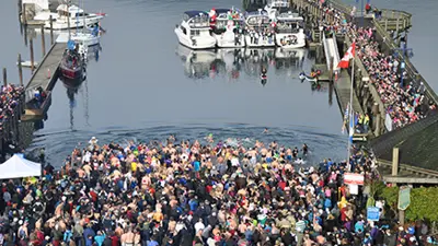 Group of people swimming in ocean