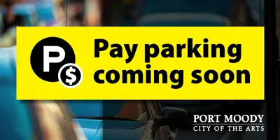 text reading pay parking is coming soon