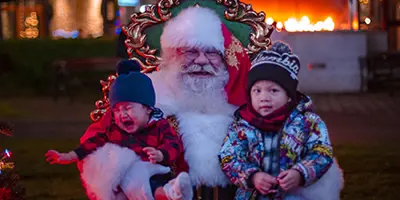 Santa with two small children