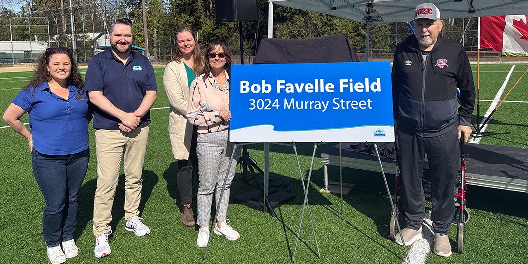 Bob Favelle and council members on Bob Favelle field during official opening ceremony