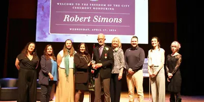Robert Simons with City Council receiving the Freedom of the City Award
