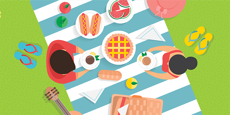 Two people on a picnic blanket